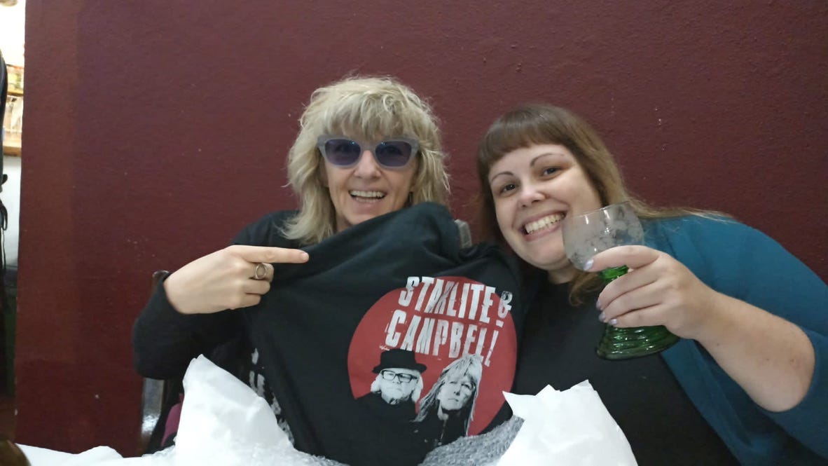 Starlite and Dani with a Starlite & Campbell t-shirt