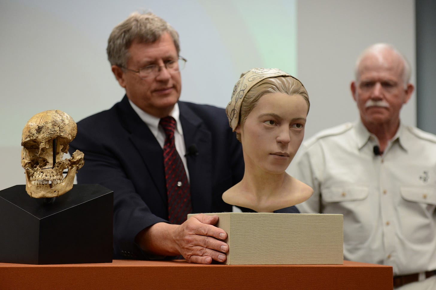 Archaeologists with a reconstruction of the Jamestown cannibalism victim.