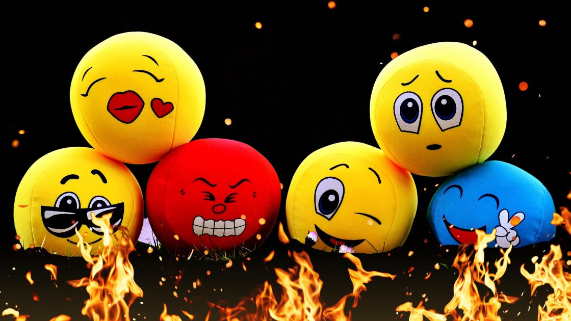 A variety of emoji-flavored squish toys show you how they really feel atop a bed of flames and sparks.