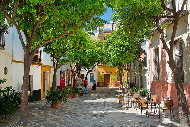 seville, plaza in santa cruz district - seville stock pictures, royalty-free photos & images