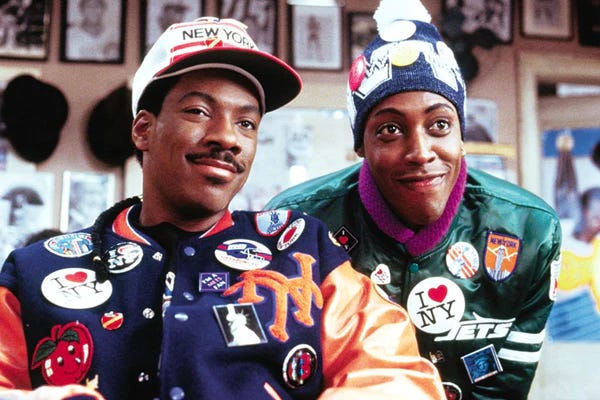 Eddie Murphy wearing a New York Mets Starter Jacket in 1988 Coming to America