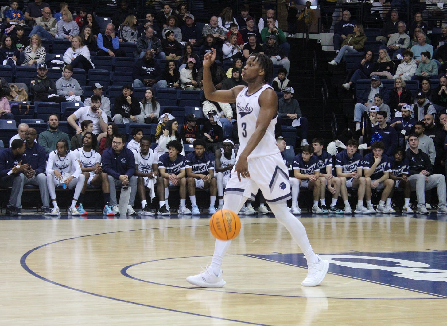 Monmouth guard Madison Durr takes the ball up the court against Towson on Feb. 8, 2025. (Photo by Adam Zielonka)