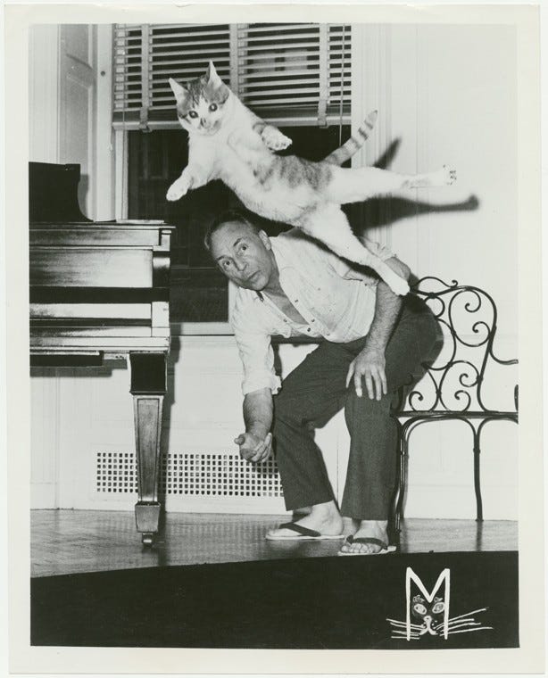 George Balanchine with, Mourka, his cat.