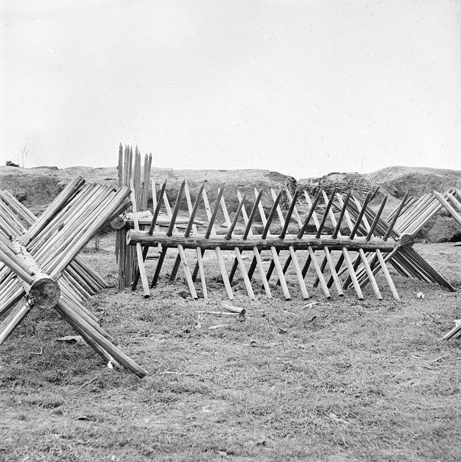 Black-and-white image of chevaux de frise.