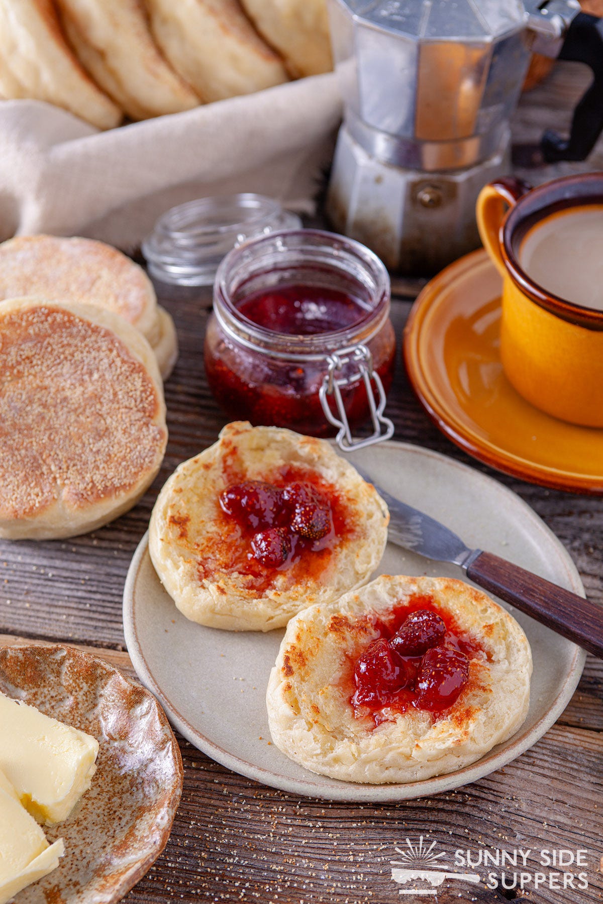 Split open English muffins with strawberry jam.