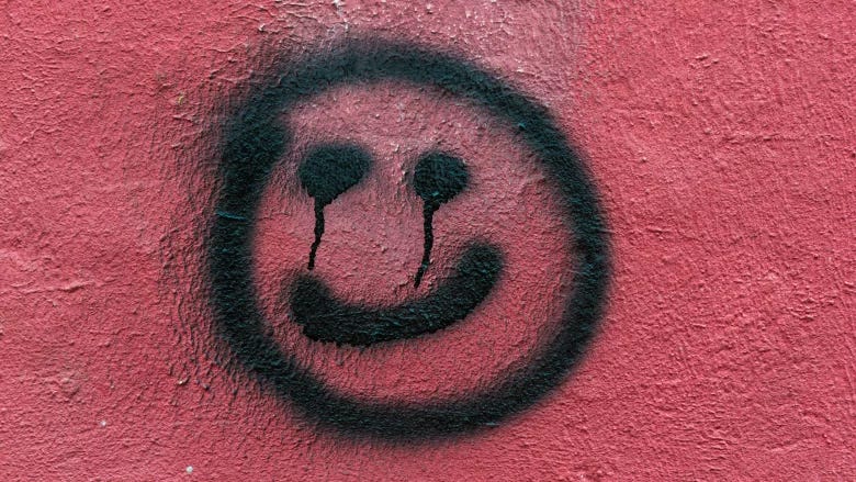 A smiley face graffiti