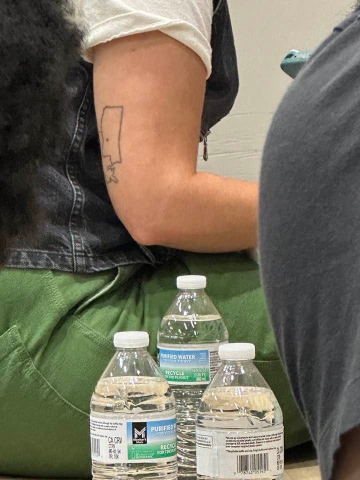 May be an image of 1 person and body of water