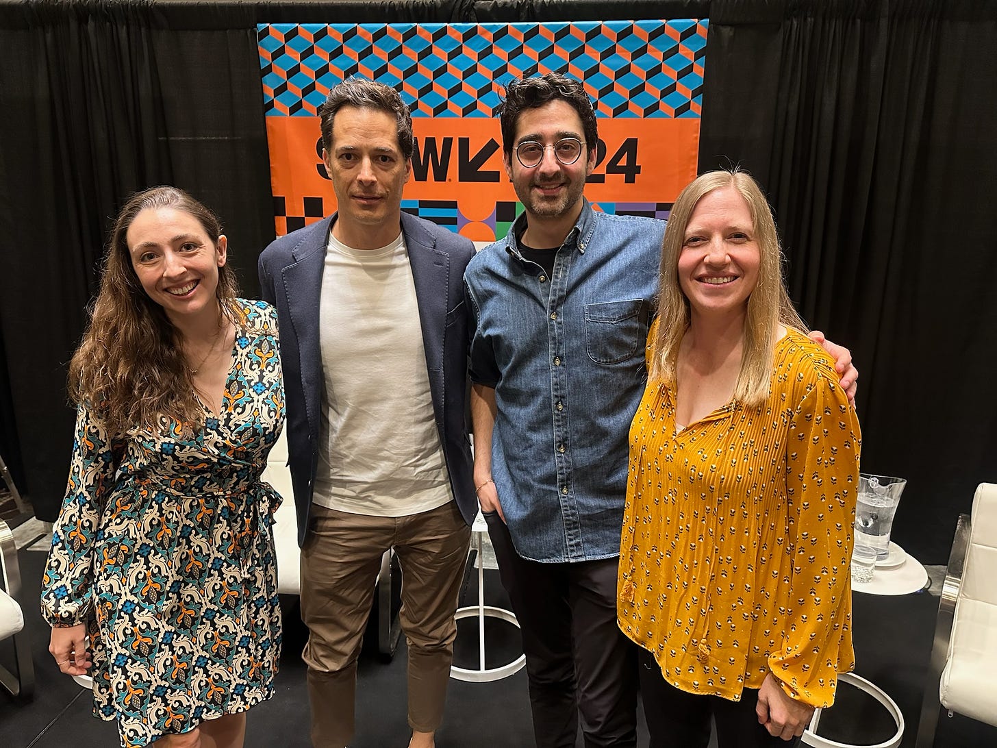 From left: Amanda Morris, Fernando Trueba, Zohar Dayan, and Rachel Kolb stand shoulder-to-shoulder onstage. A black curtain and colorful "SXSW" banner is behind them.