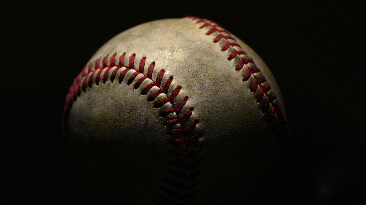 Baseball on black blackground