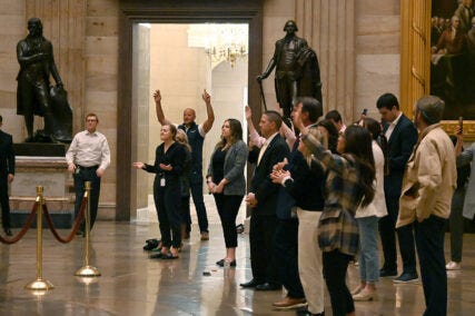 Republican strategist Timothy Teepell, rear left with arms raised, attends a Sean Feucht performance in the Rotunda of the U.S. Capitol, March 9, 2023, in Washington. (RNS photo/Jack Jenkins)