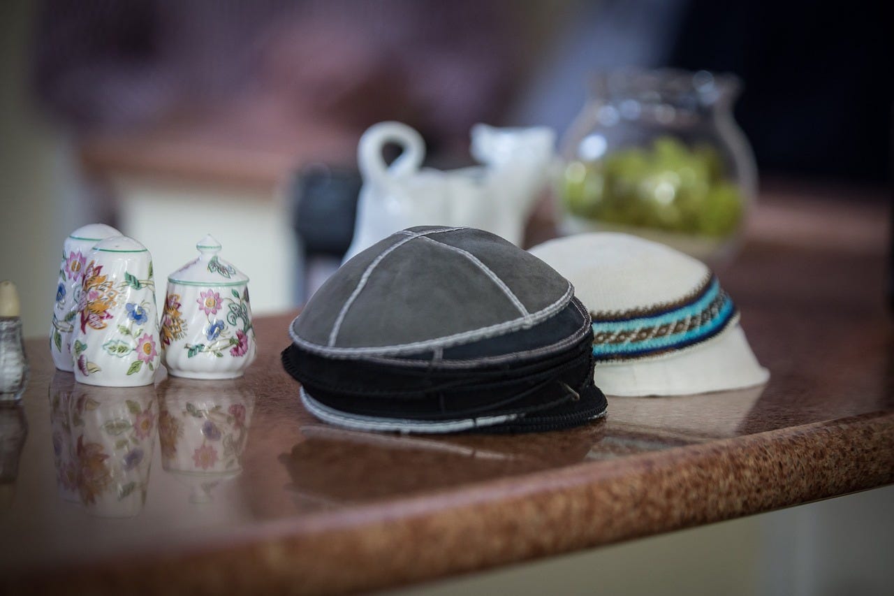 a table with yarmulkes set up for people to take