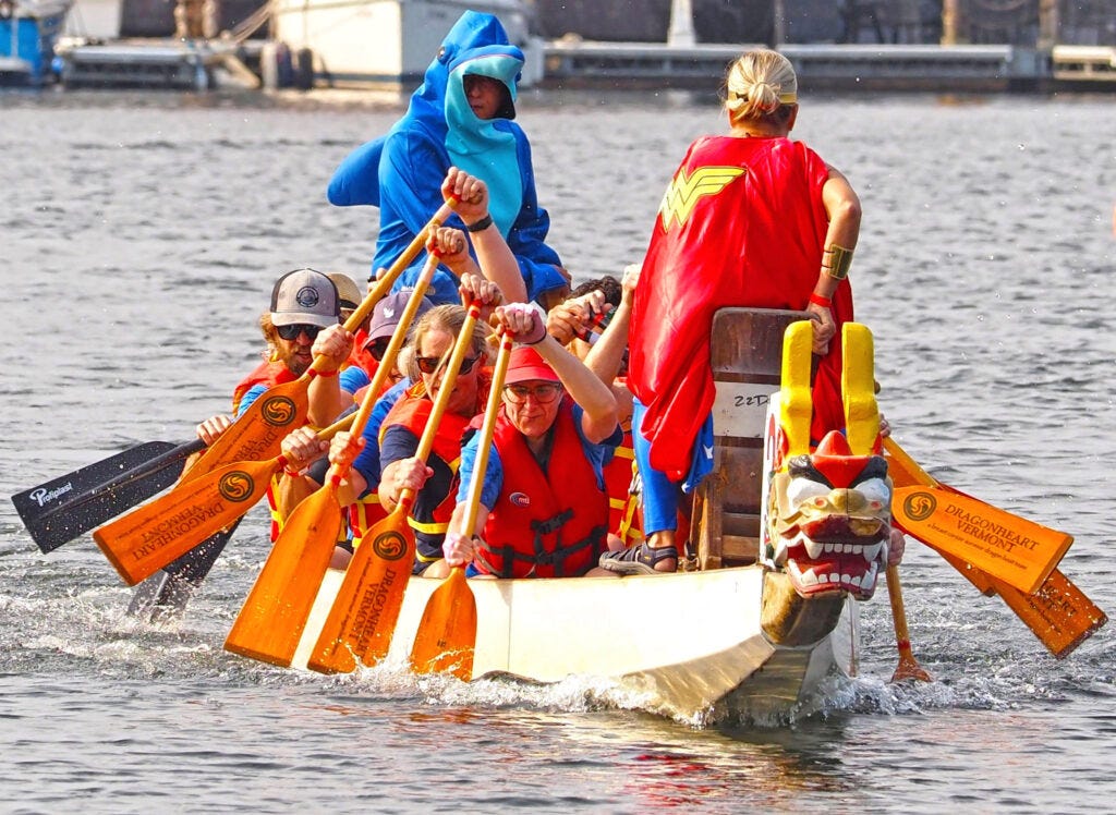 Rotarians madly paddling at this summer’s Dragonboat Festival! Note shark steersman.