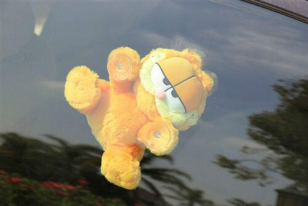 The Great Garfield Car Window Toy Craze | Garfield, Garfield ...