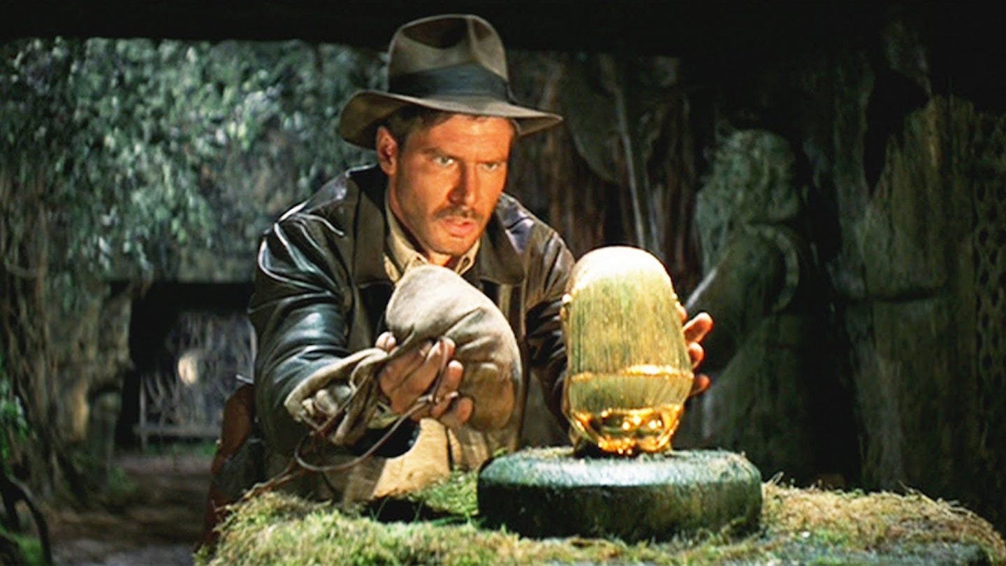 https://images.bauerhosting.com/legacy/empire-images/features/560ebf0b50e6c513721c3539/Raiders-Of-The-Lost-Ark.jpg?ar=16%3A9&fit=crop&crop=top&auto=format&w=1440&q=80