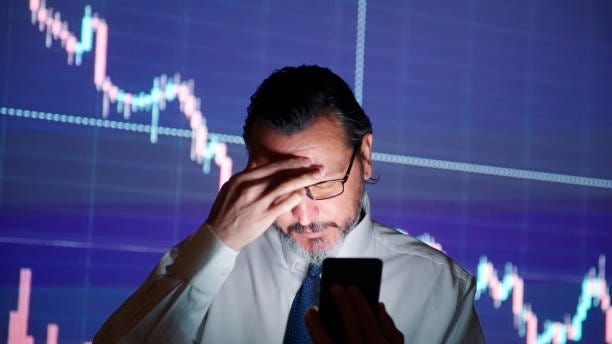 100+ Sad Stock Trader Stock Photos, Pictures & Royalty-Free Images - iStock