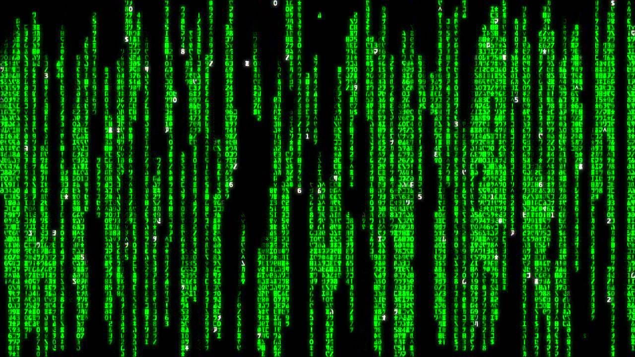 Matrix code falling down a screen. Bright green letters over a black background.