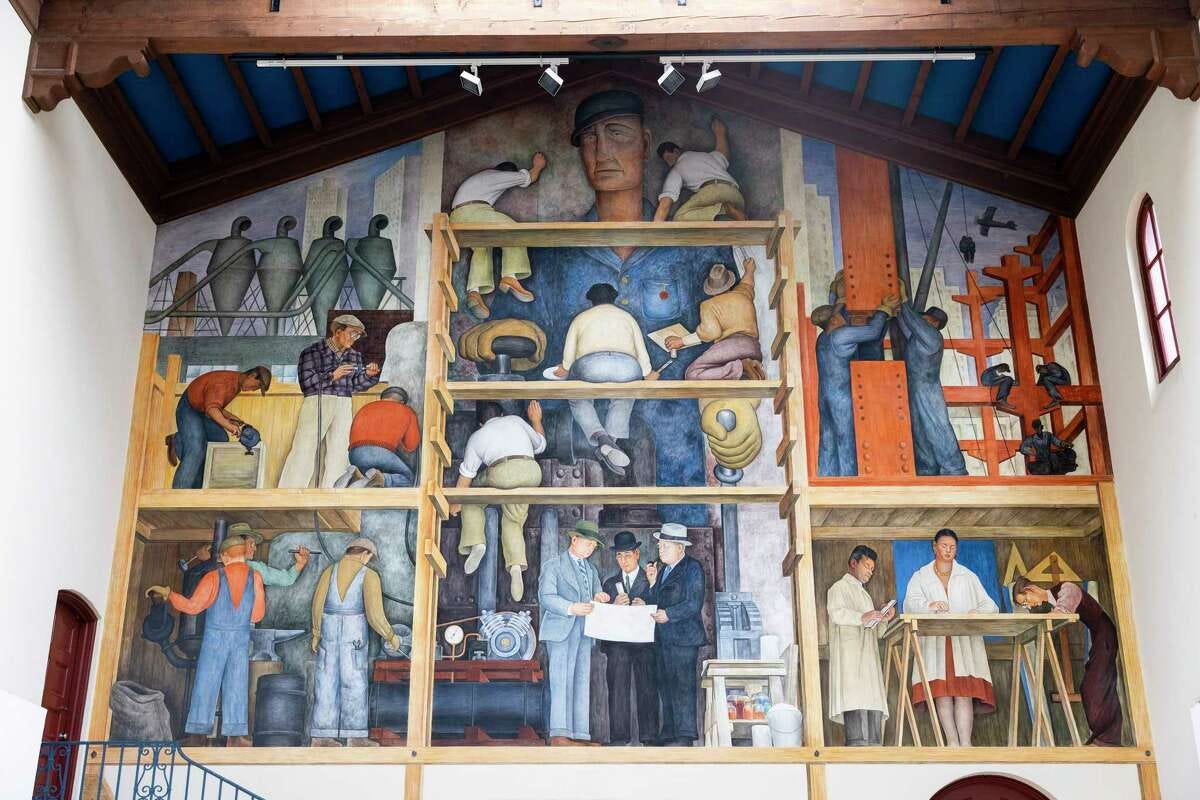 “The Making of a Fresco Showing the Building of a City,” painted by Diego Rivera in 1931, sits in a private gallery at the San Francisco Art Institute. 