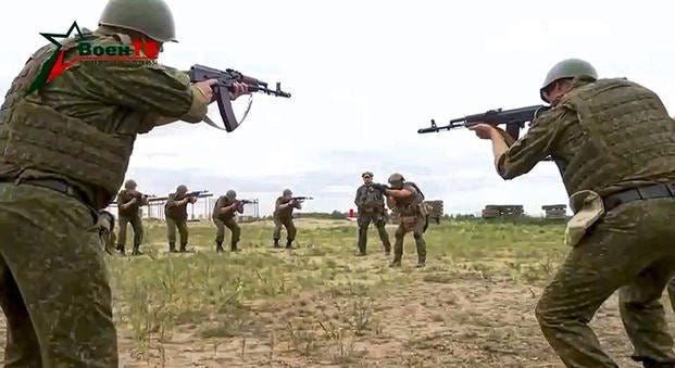 Belarusian soldiers attend a training by mercenary fighters from Wagner private military company