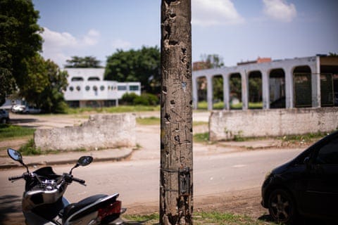 A wooden post with bullet holes. A wooden post with bullet holes.