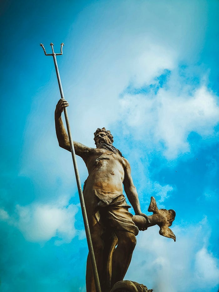 Greek God statue.