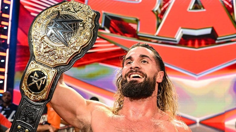 Seth Rollins Poses With His WWE Title