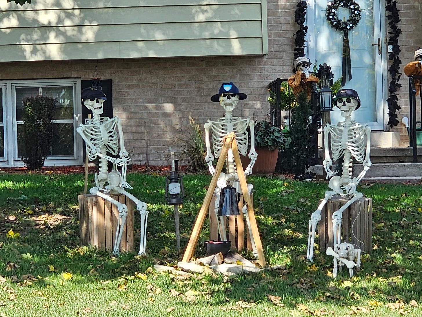 Three skeletons sit around a campfire outside Gettysburg, PA.
