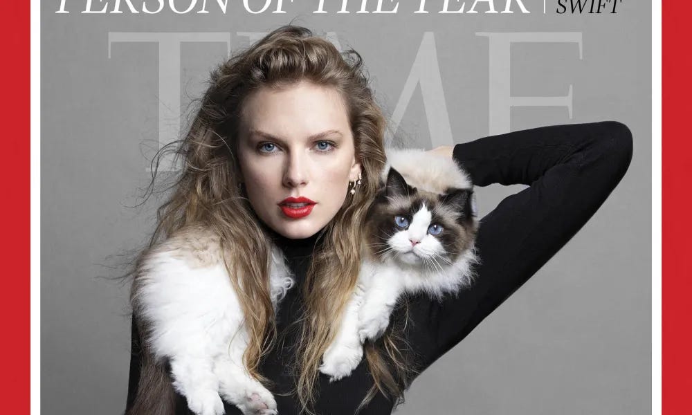 Taylor Swift wearing a cat like a boa for some reason on the cover of Time.