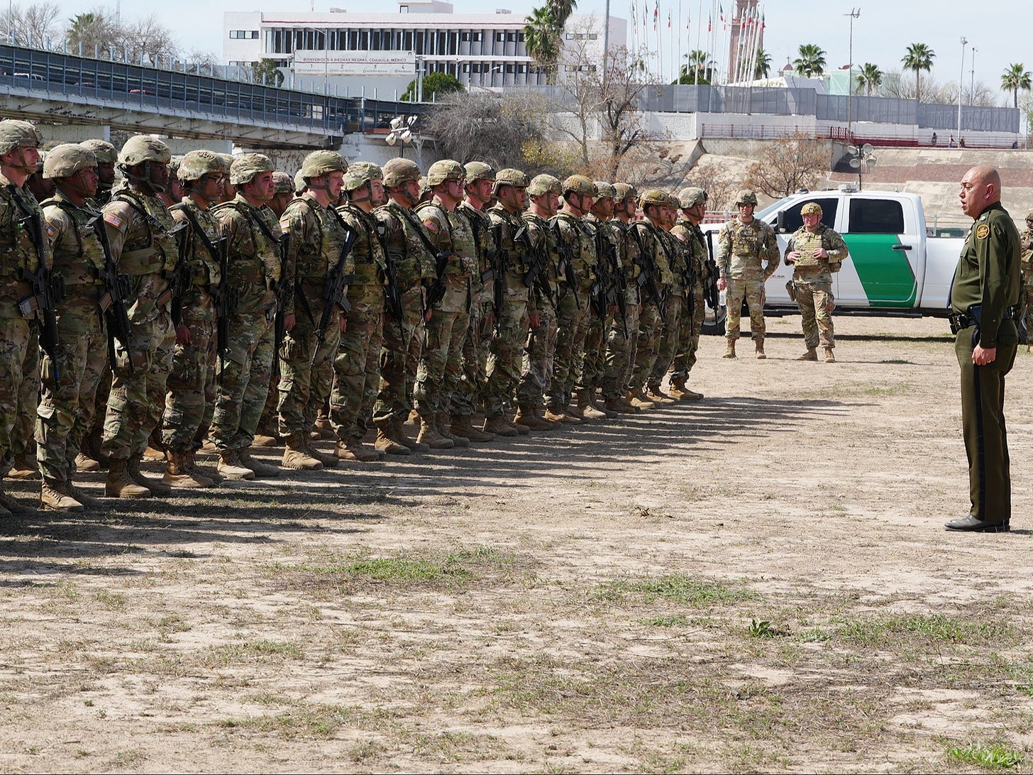 A US Border Patrol Agent deputizes 290 Texas troops to enforce immigration laws in Eagle Pass on February 19, 2025. A US Border Patrol Agent deputizes 290 Texas troops to enforce immigration laws in Eagle Pass on February 19, 2025.