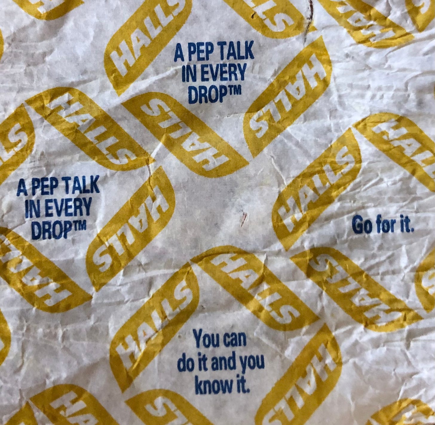 A cough drop wrapper that says, “a pepe talk in every drop” and “Go for it.”