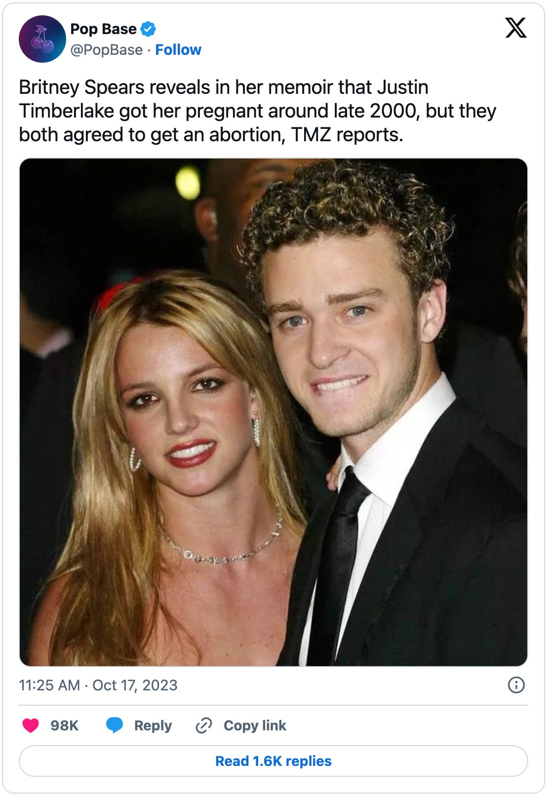 Pop Base tweet with a circa-2000s picture of Britney and J-Timb, which reads “Britney Spears reveals in her memoir that Justin Timberlake got her pregnant around late 2000, but they both agreed to get an abortion, TMZ reports.”