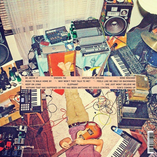 r/AlbumArtPorn - The back-cover of Tame Impala's album Lonerism: a photograph of his home studio. [800x800]