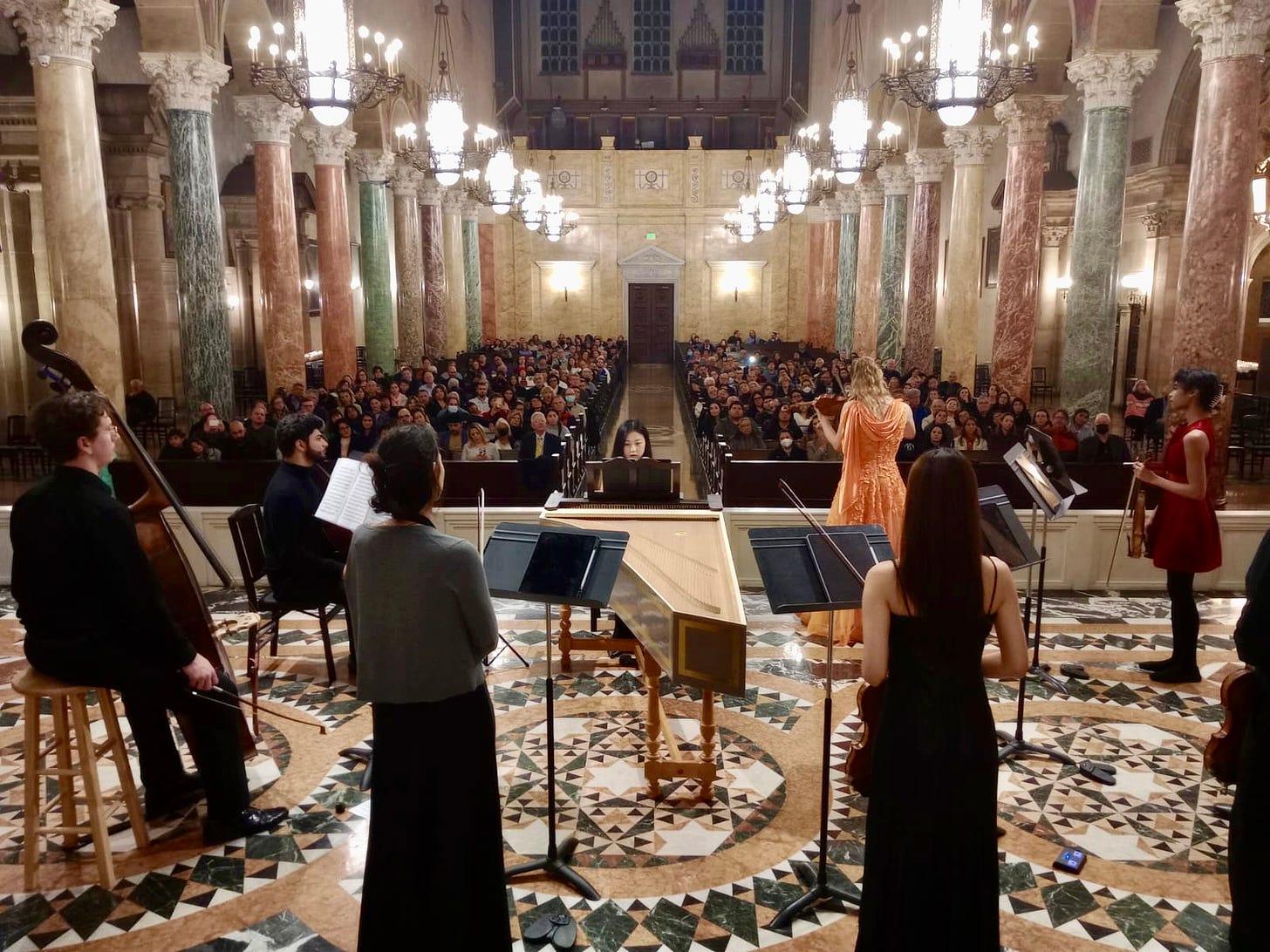 A small classical ensemble plays in a church