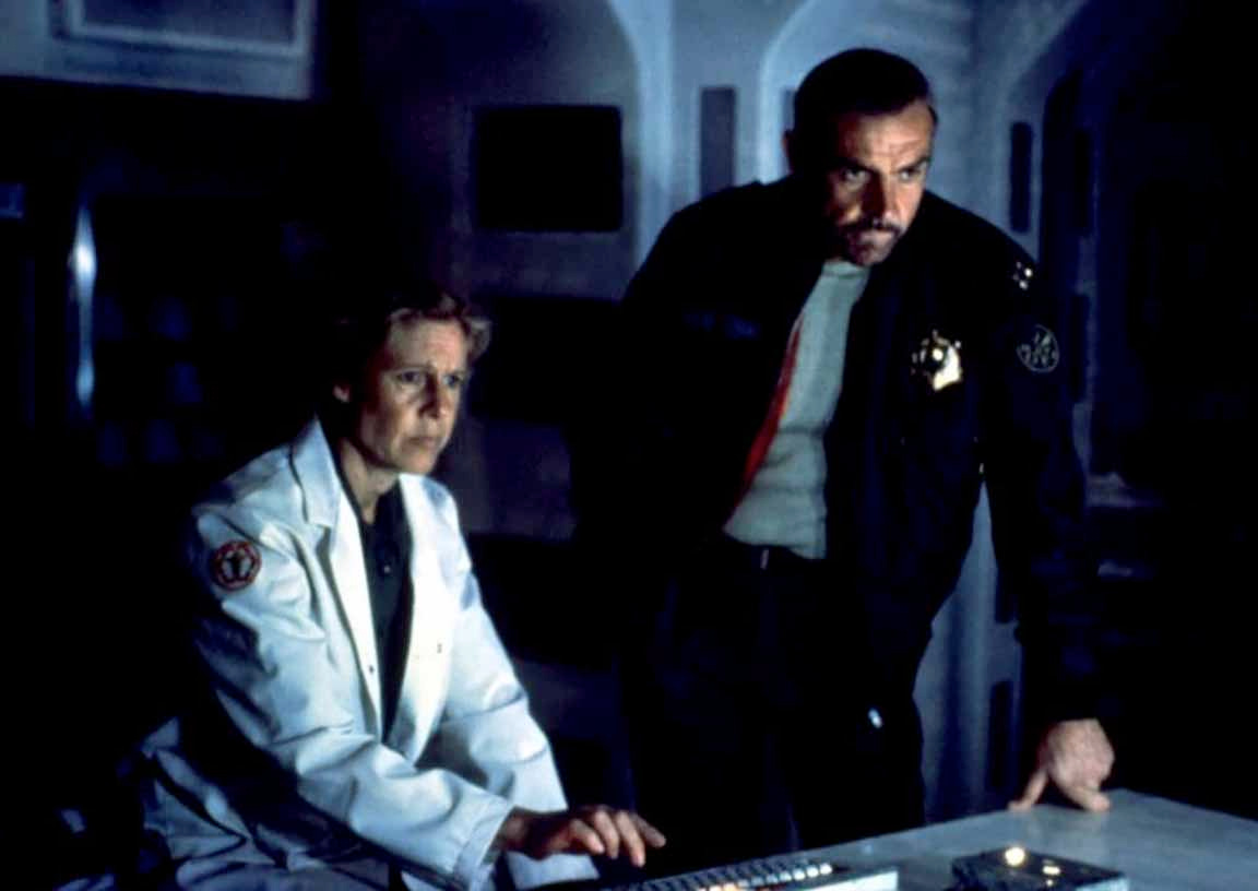 Frances Sternhagen wearing a lab coat sitting at some sort of science-looking console while Sean Connery stands behind her watching her do science-sleuthing or something, I forget, I haven't seen the movie in forever