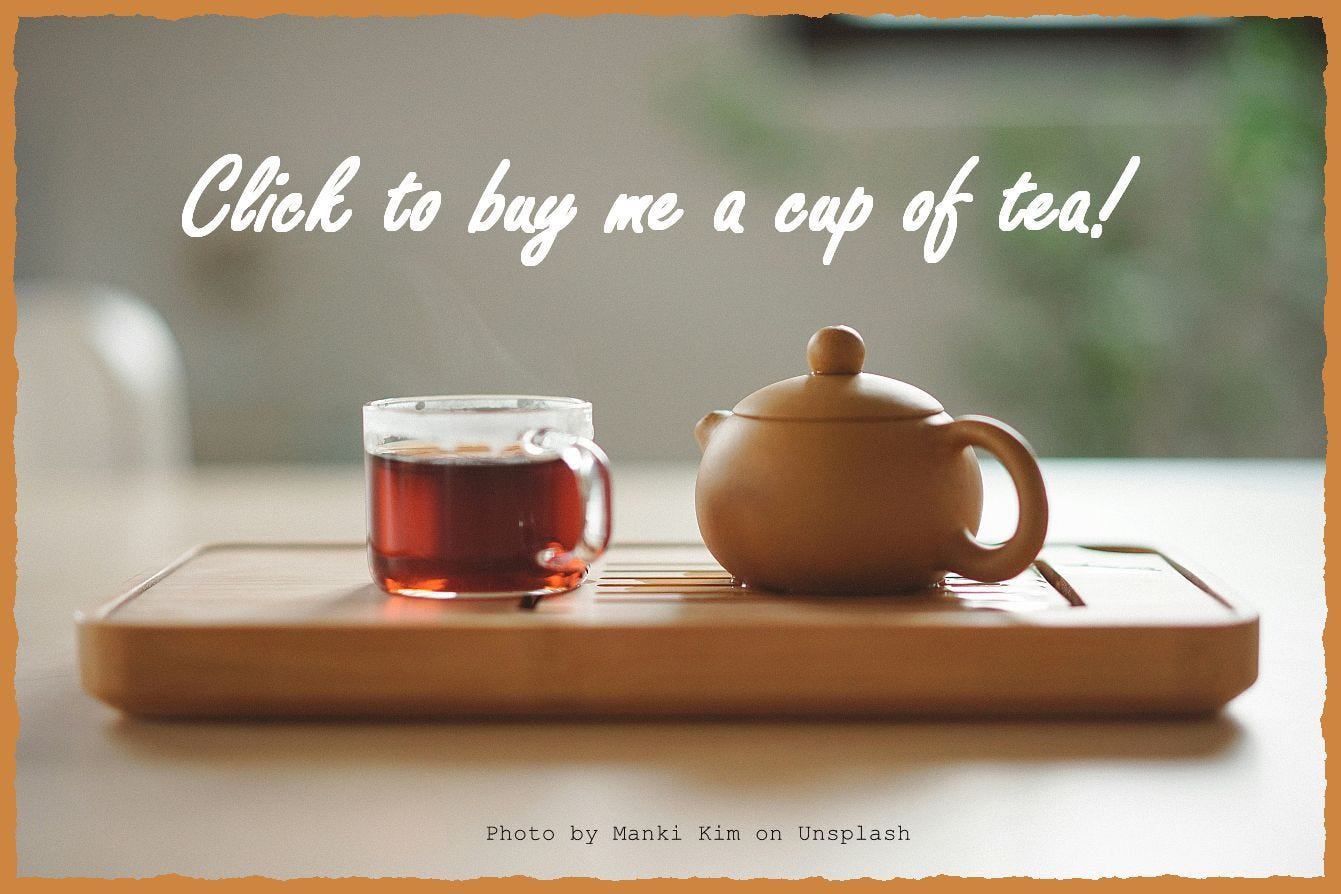 Picture of a clay teapot and clear glass cup of hot tea on a wooden board, annotated "Click to buy me a cup of tea!"