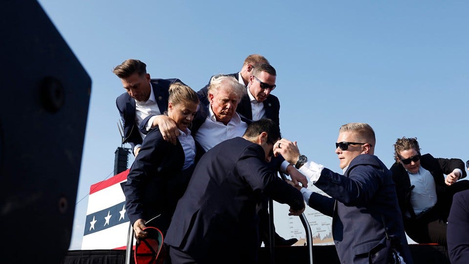 Secret Service agents rush President Trump to safety