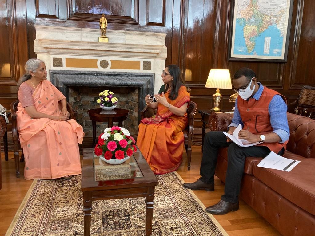 The founders of EasyInherit talking to the Union Finance Minister at her office