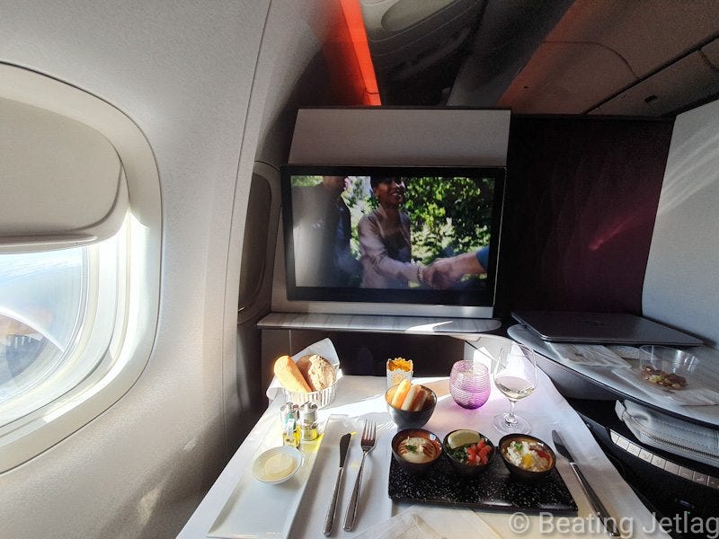 Business class cabin with meal