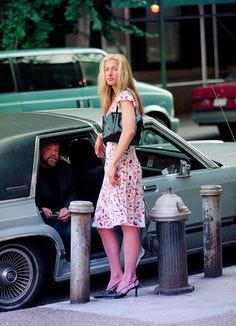 This contains an image of: 9 Best Carolyn Bessette-Kennedy Style Moments & Fashion