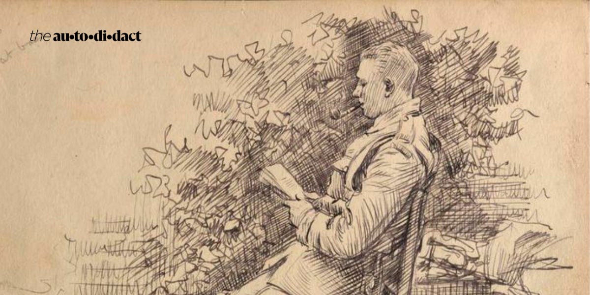 A man reads in a chair.