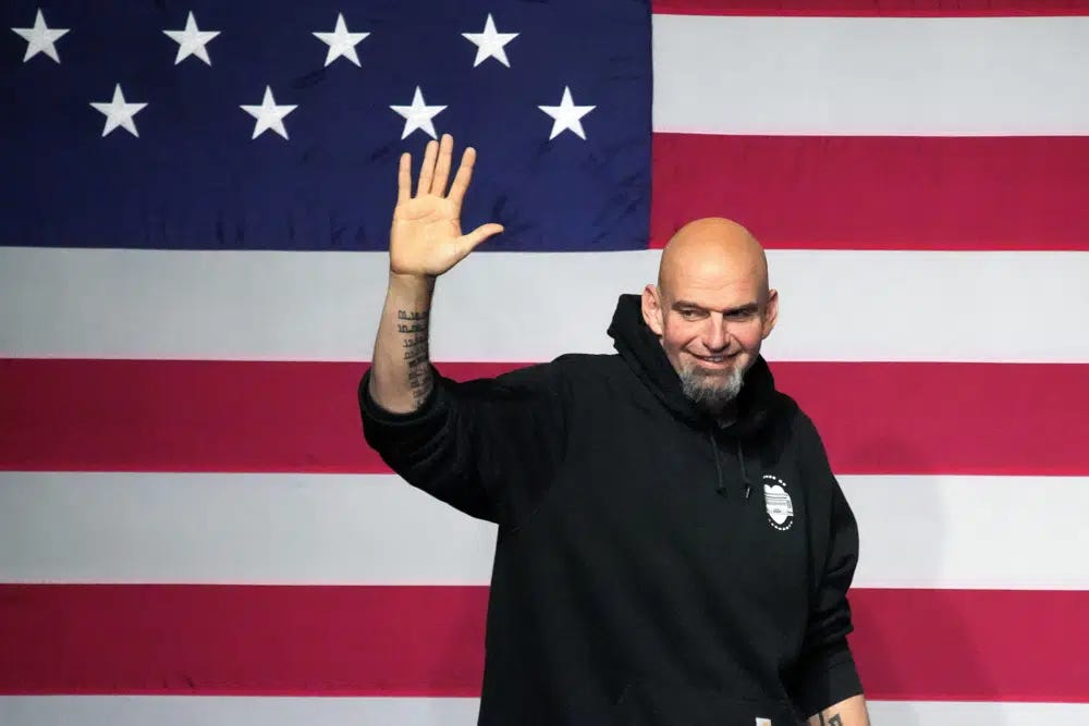 FILE - Pennsylvania Lt. Gov. John Fetterman takes the stage at an election night party in Pittsburgh on Nov. 9, 2022. Fetterman, the Pennsylvania Democrat who suffered a stroke during his campaign last year, was hospitalized Wednesday night, Feb. 8, 2023, after feeling lightheaded while attending a Senate Democratic retreat, his office said. (AP Photo/Gene J. Puskar, File)