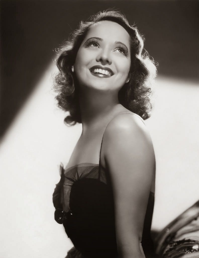 black and white glamour shot of Merle Oberon