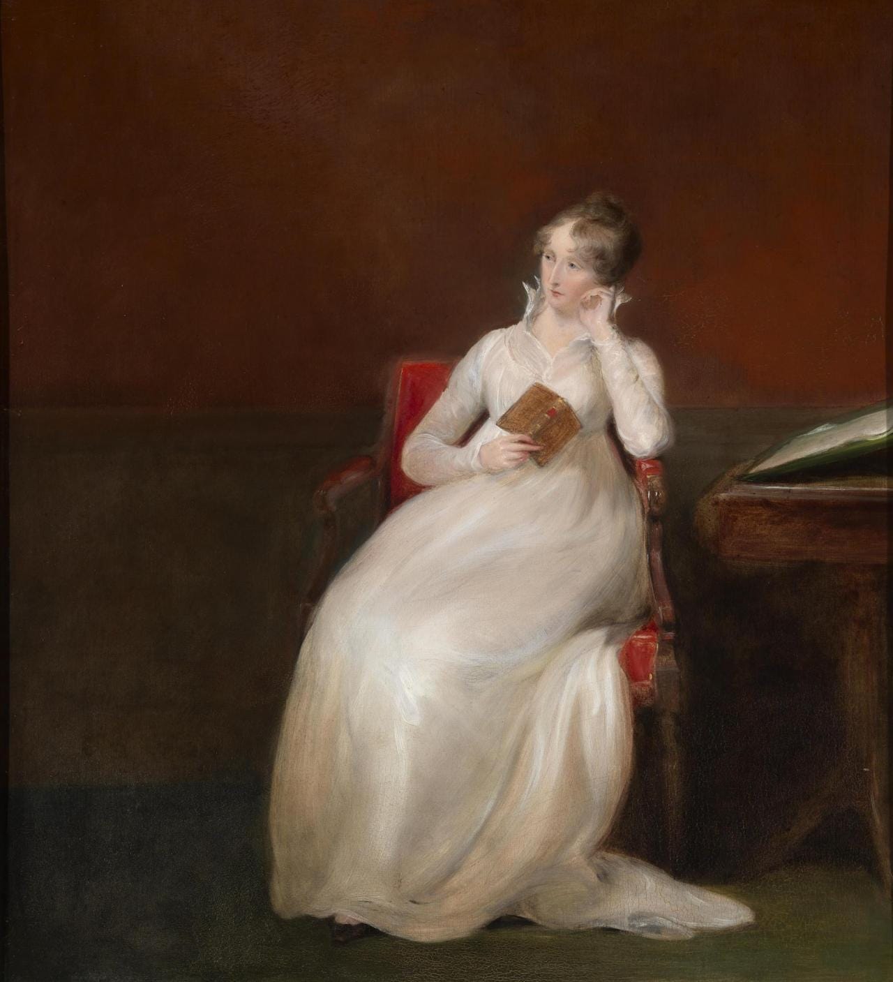 Painting of a Regency woman holding a small book in her hand while looking off in the distance. 
