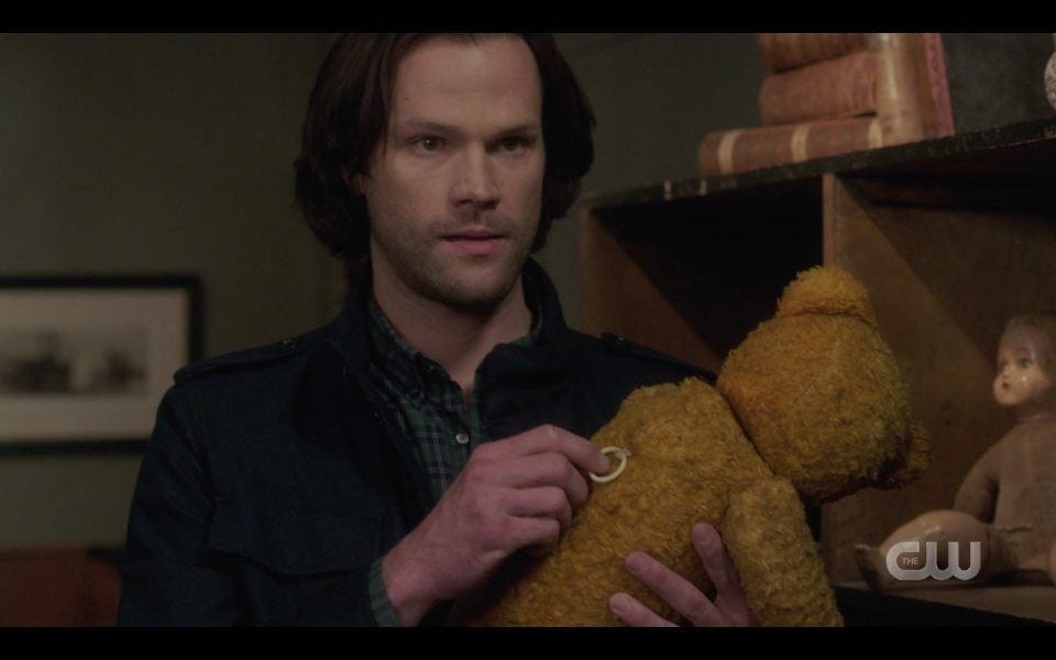 sam winchester with occult teddy bear spn 1413