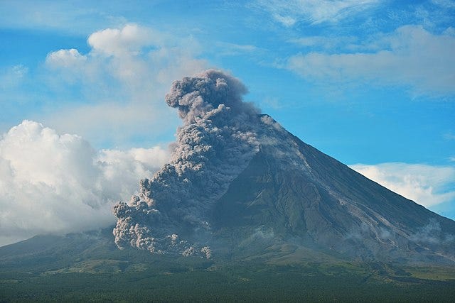 Image of the Mayon volcano erupting as seen from the Our Lady of the Gate Parish Church, Daraga, Albay, Phillippines