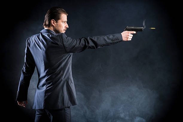 assassin, gangster suit aiming with gun and fires, assassin, killer - smoking gun stock pictures, royalty-free photos & images