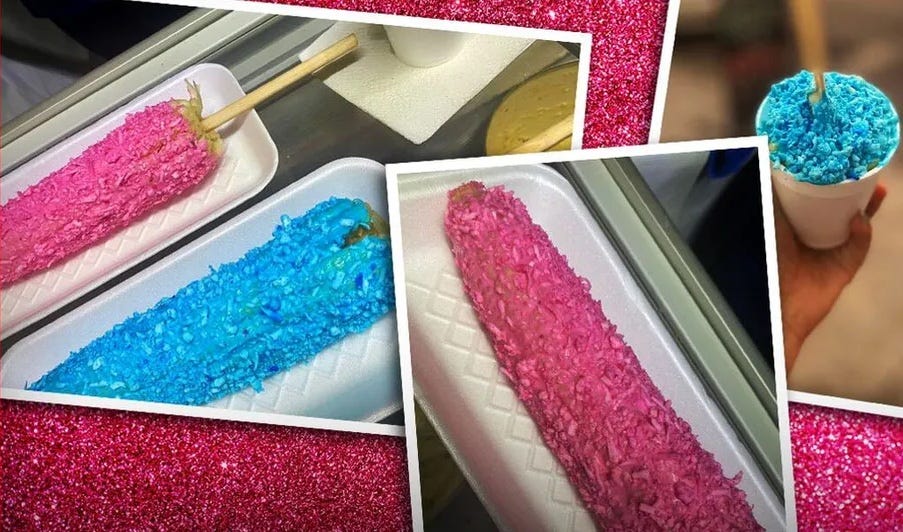 Roasted corn cobs with pink and blue decorations