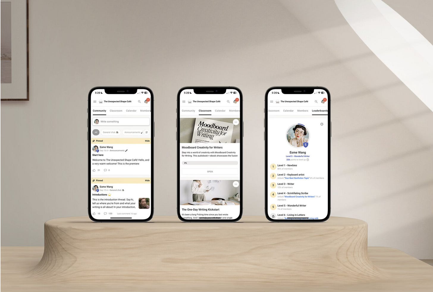 three phone mockups with the Academy on the screens