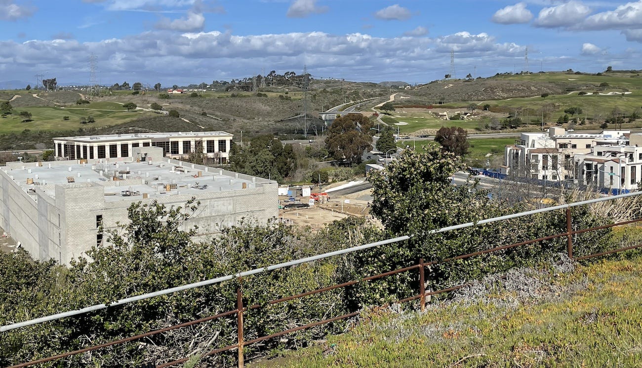 More than 400 apartments are being constructed near the intersection of Palomar Airpot Road and Aviara Parkway in a view from Cottage Row. Residents railed against the city’s rezoning plan for 18 parcels, although the City Council removed two from the plan. Steve Puterski photo