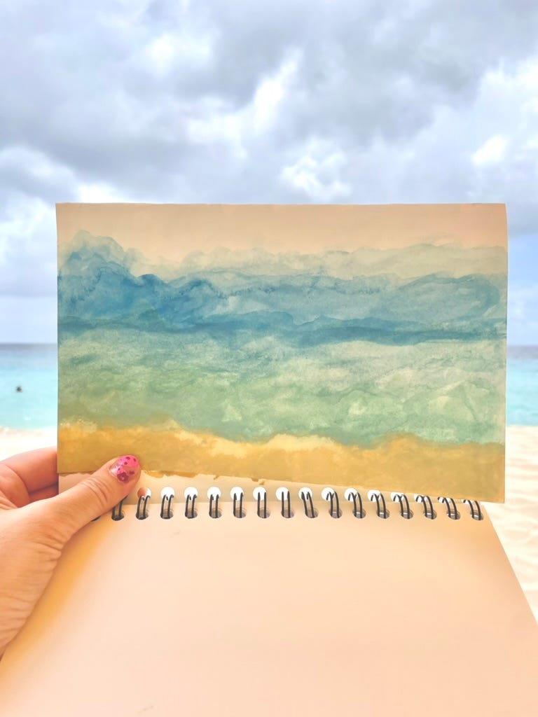 Watercolor painting of the sand, beach and sky.