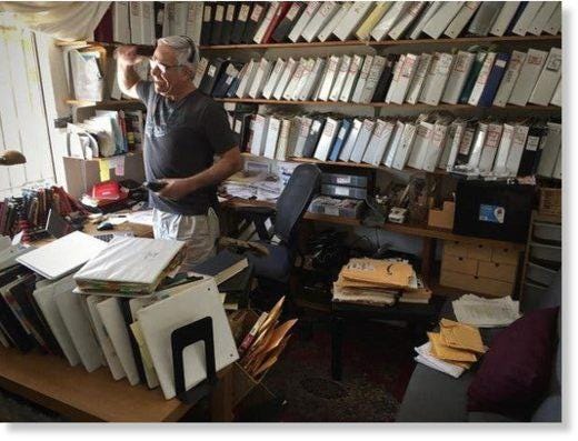 A person standing in a room with many books
AI-generated content may be incorrect. A person standing in a room with many books
AI-generated content may be incorrect.